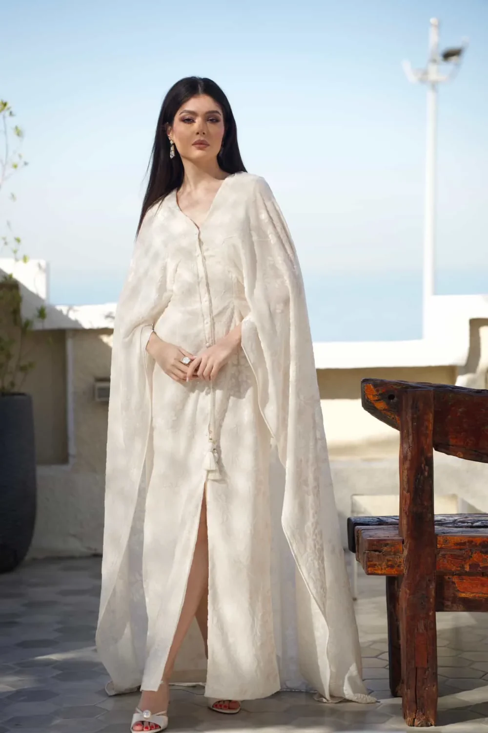 Pearly White floral burnout maxi dress with cape sleeves from the Ramadan 2026 Collection